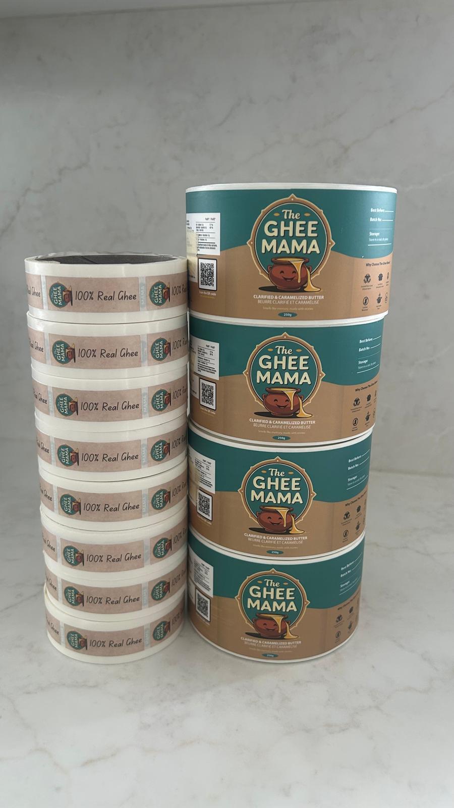 Ghee Mama product labels on stacked rolls